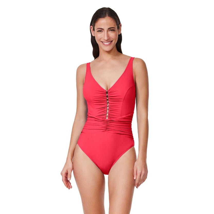 Woman wearing a red swimsuit on a white background