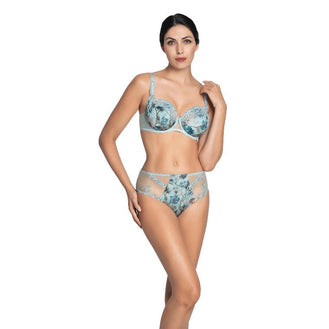Woman wearing a floral lingerie set on a white background