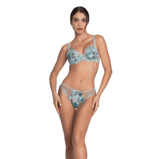 Woman wearing a floral lingerie set on a white background
