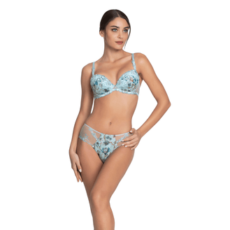 Woman wearing a floral lingerie set on a white background